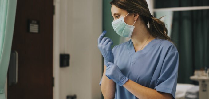 Healthcare Worker with Gloves and Mask